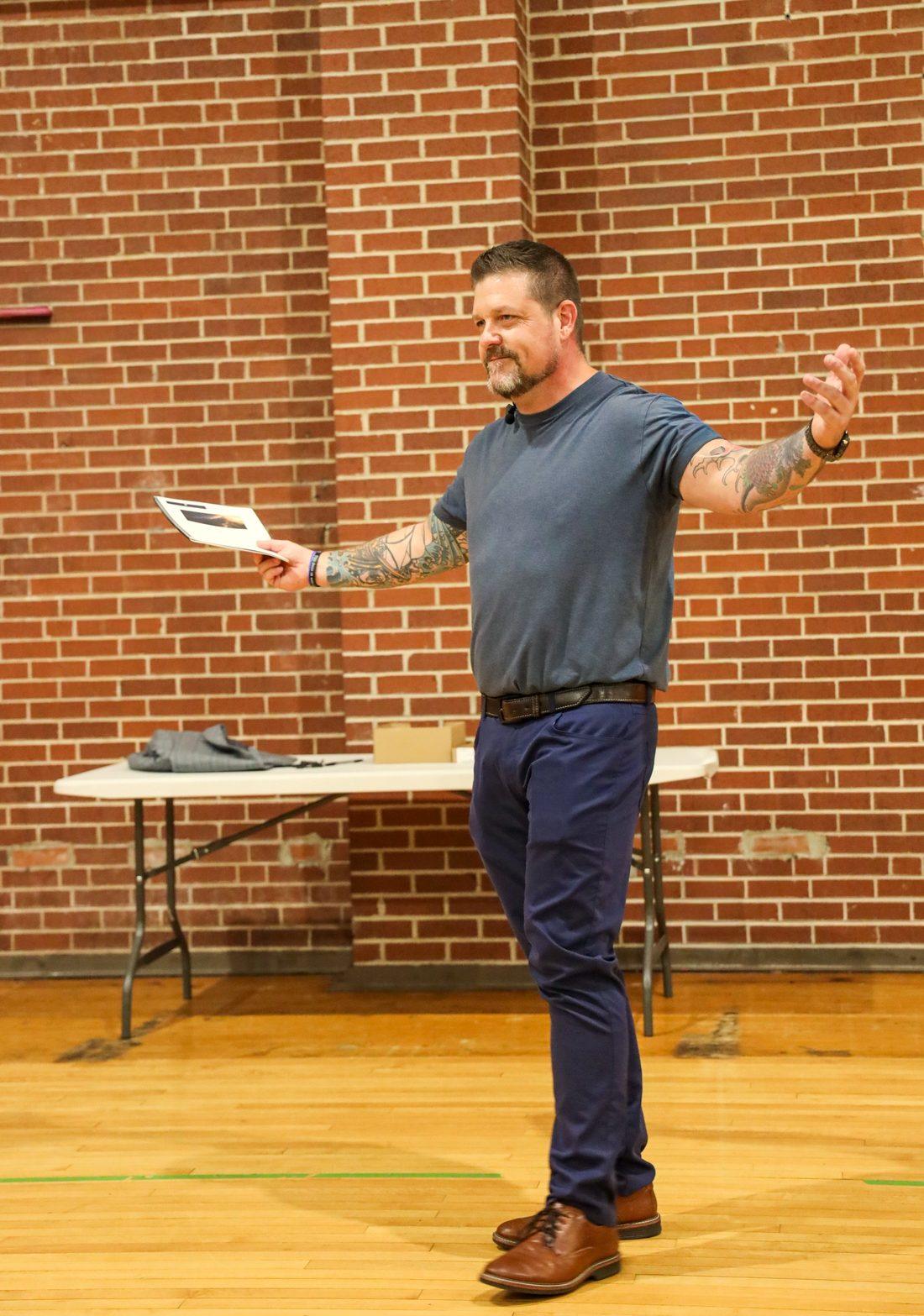 Steve teaching in a gymnasium