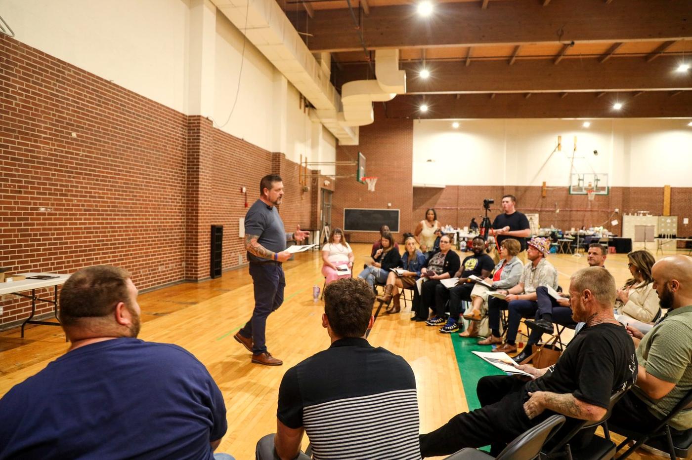 Steve leading a workshop with participants seated in a circle